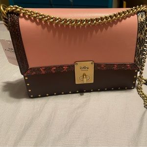 NWT Jennifer Lopez Hutto Coach purse. Received as gift and never carried.